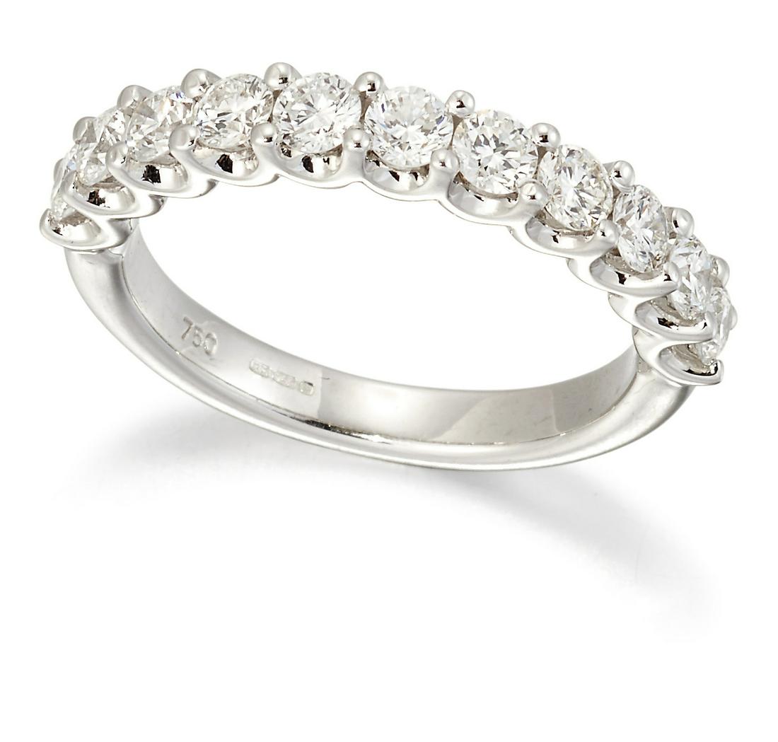 AN 18 CARAT WHITE GOLD DIAMOND HALF HOOP RING (1 of 1)