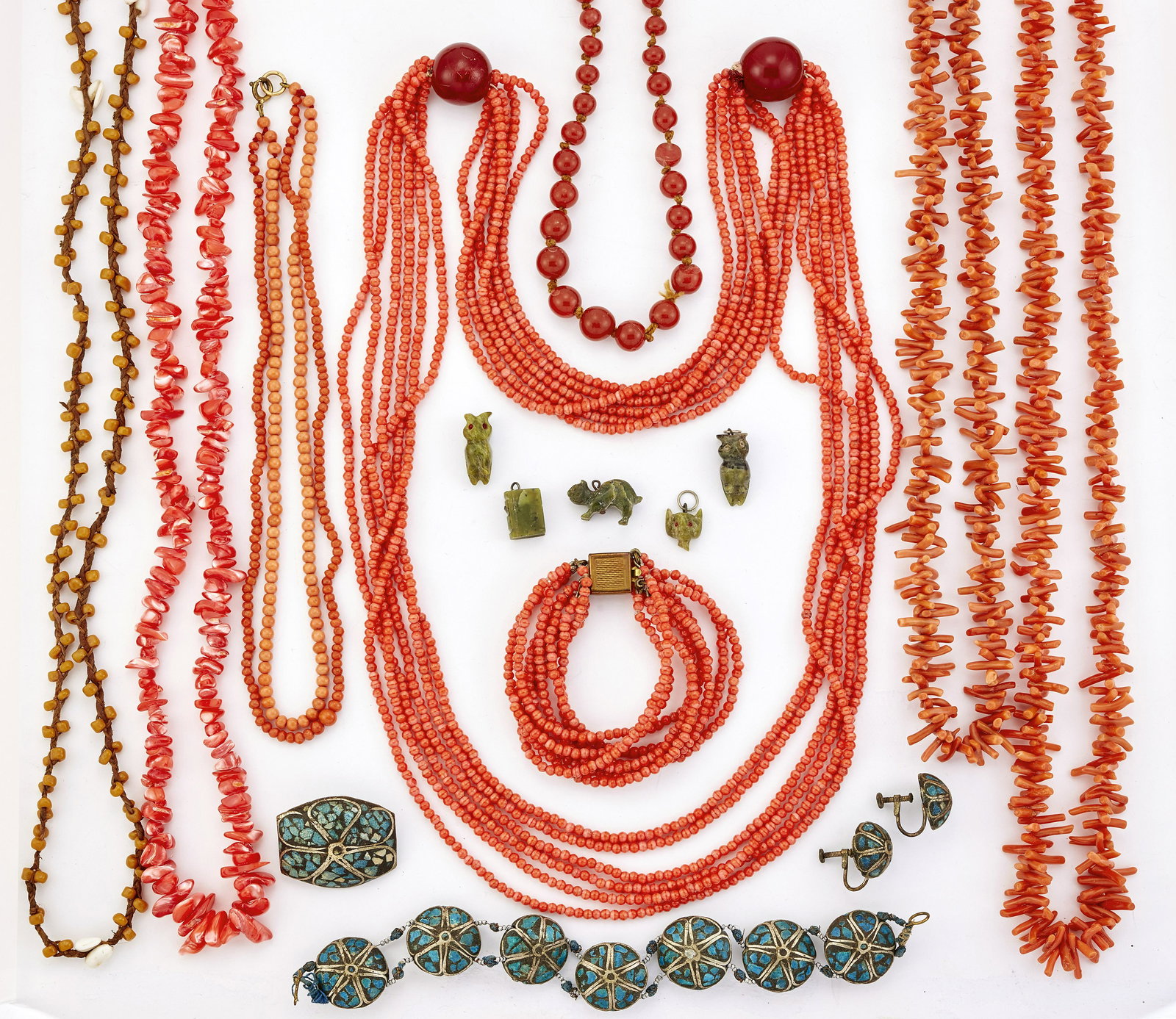 CORAL BEAD NECKLACES AND COSTUME JEWELLERY: A TWO STRAND CORAL BEAD NECKLACE; TWO BRANCH CORAL NECKLACES; AN IMITATION CORAL NECKLACE AND PAIR OF BRACELETS; A DYED MOTHER-OF-PEARL BEAD NECKLACE; AN ORANGE BEAD NECKLACE; A GLASS BEAD NECKLACE; A