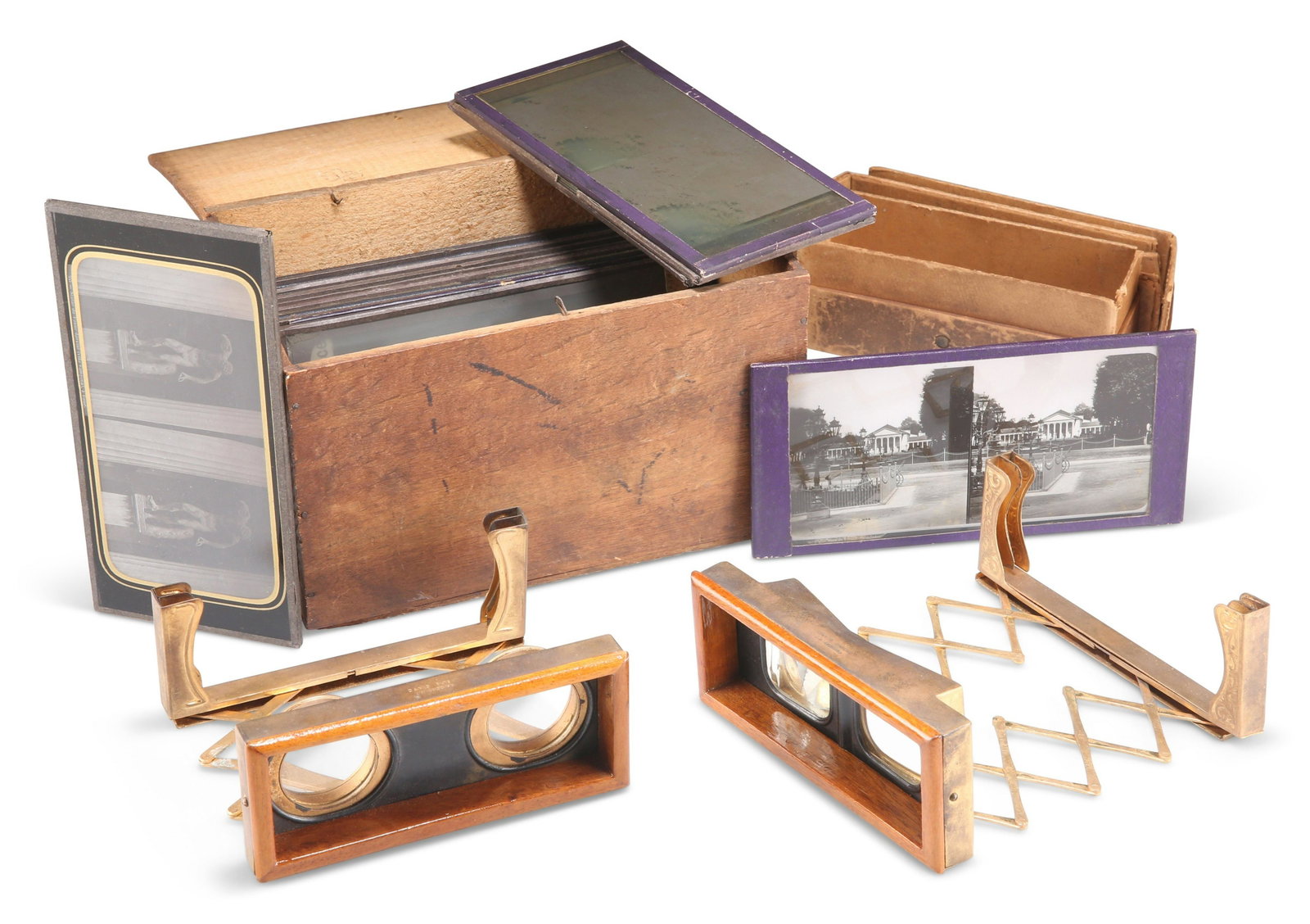TWO LATE VICTORIAN 'J. DAY' PORTABLE STEREOSCOPES: TWO LATE VICTORIAN 'J. DAY' PORTABLE STEREOSCOPES TWO LATE VICTORIAN 'J. DAY' PORTABLE STEREOSCOPES, wood and brass mounted and of collapsable design with adjustable arms, marked 'Day's Patent GB. 13.