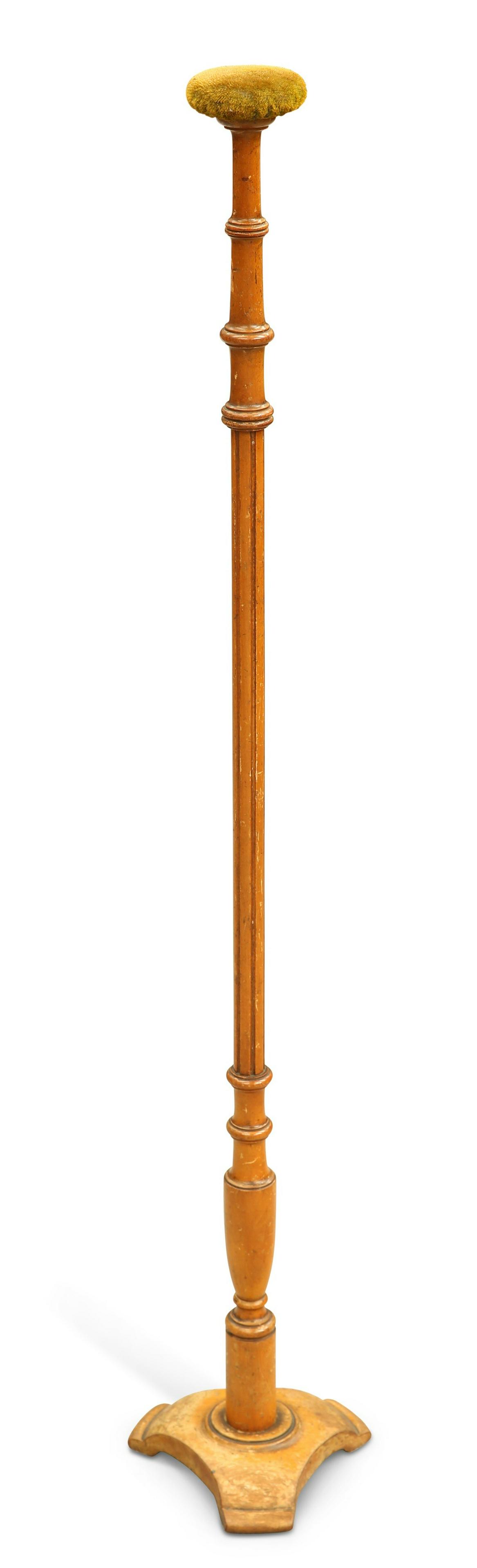 A VICTORIAN SATIN BIRCH WIG STAND: A VICTORIAN SATIN BIRCH WIG STAND A VICTORIAN SATIN BIRCH WIG STAND, with slender fluted and vasi-form stem, issuing from a weighted tri-form base. 115.5cm high