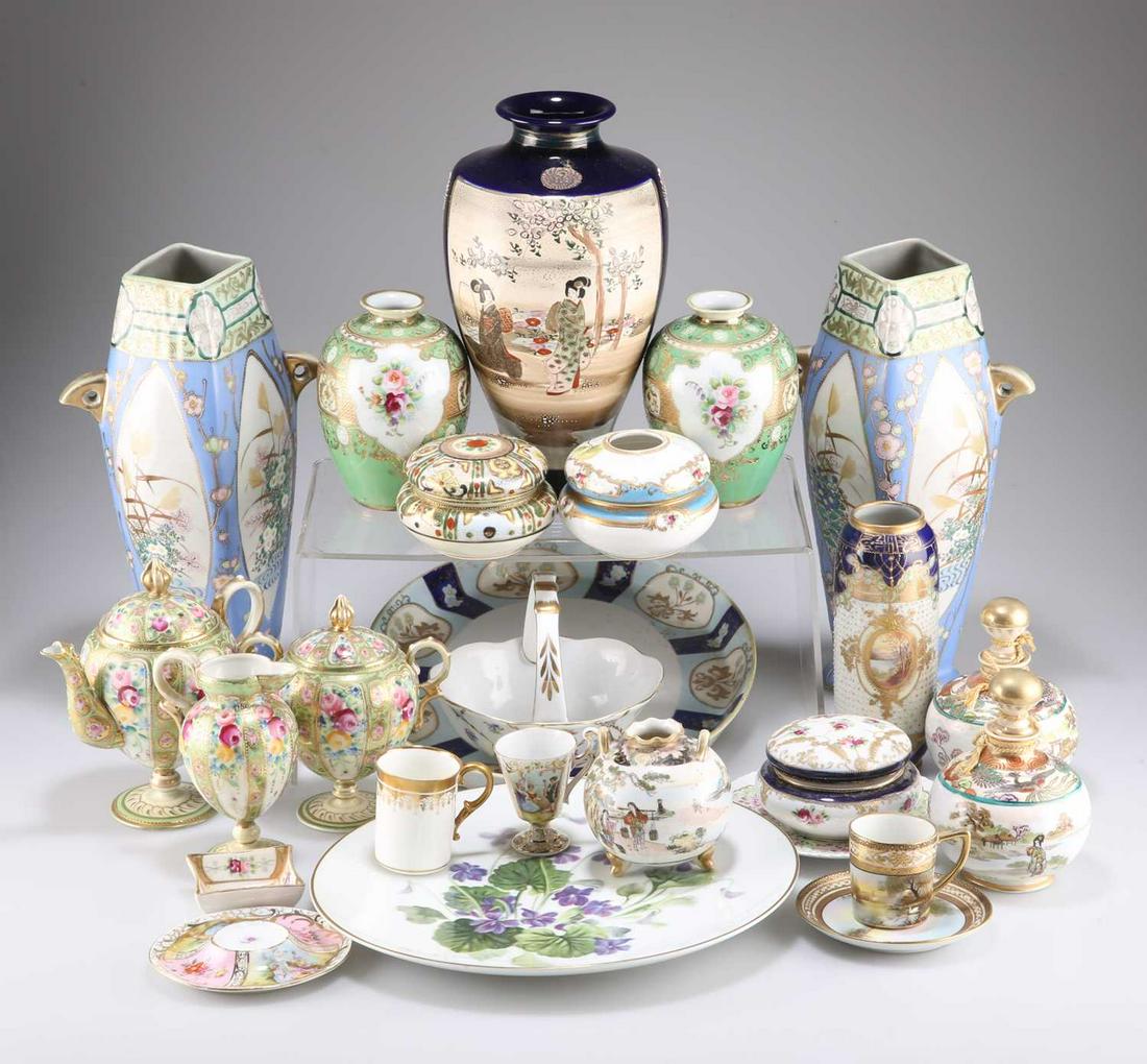 A QUANTITY OF NORITAKE CHINA: A QUANTITY OF NORITAKE CHINA, including: a green ground tea pot, sugar bowl and milk jug; a pair of spirit flasks; three pot pourri bowls; a wall plaque; a large oval tray; a coffee can and saucer, an