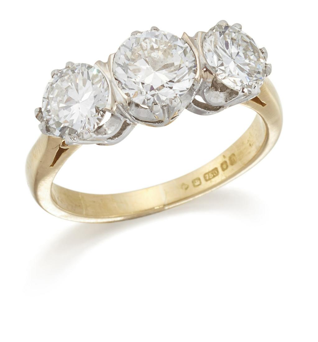 AN 18 CARAT GOLD DIAMOND THREE STONE RING (1 of 1)