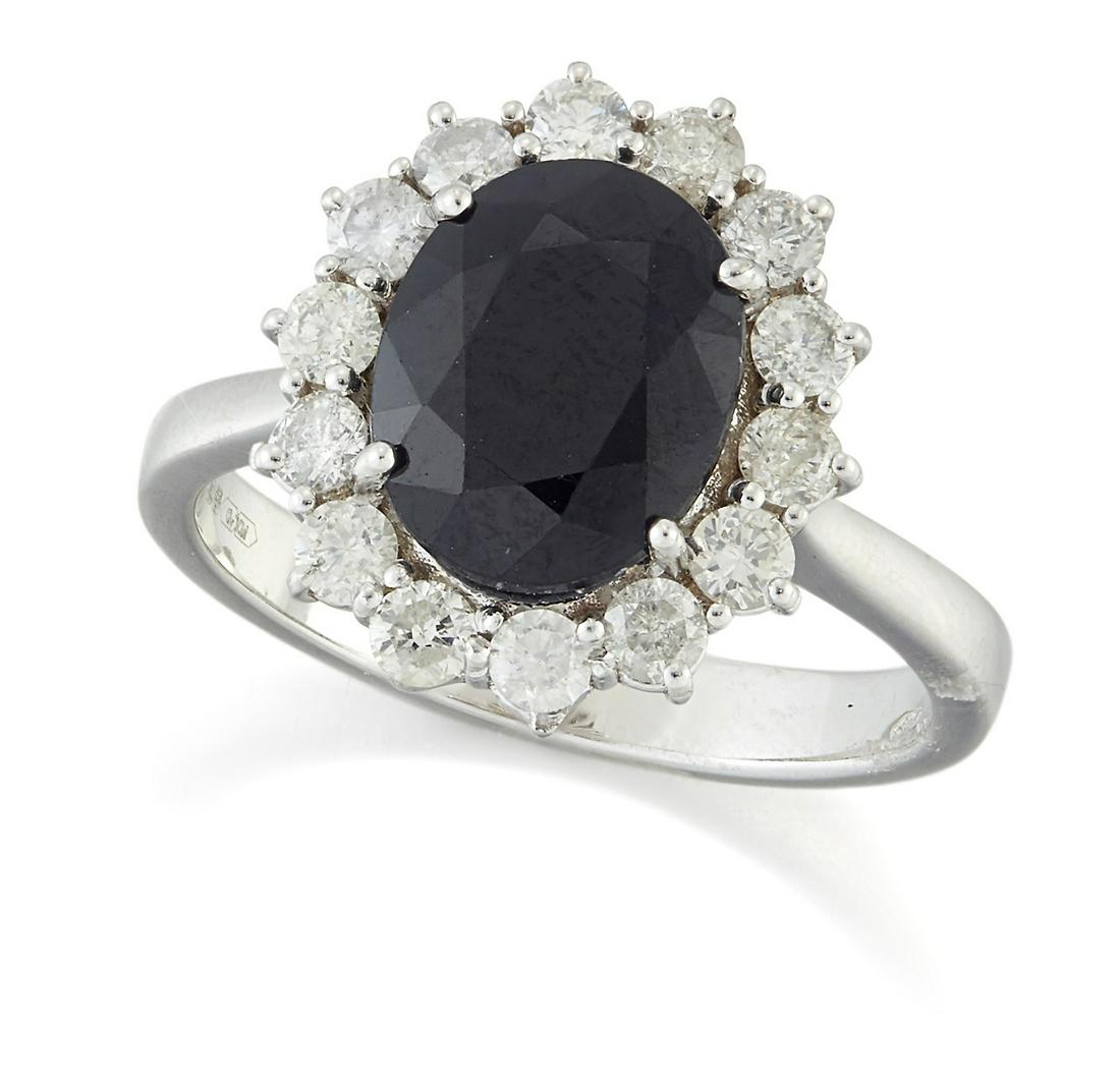 AN 18 CARAT GOLD SAPPHIRE AND DIAMOND CLUSTER RING (1 of 1)