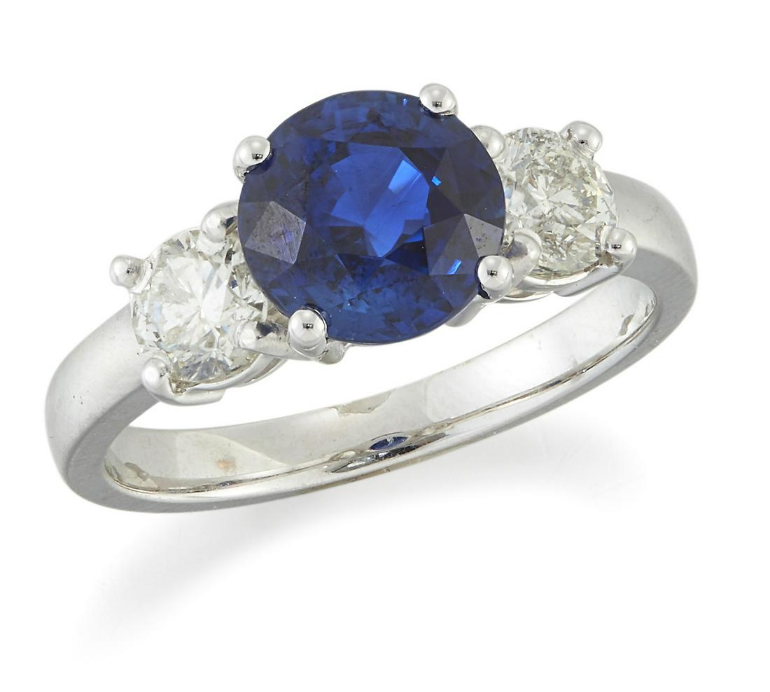 AN 18 CARAT WHITE GOLD SAPPHIRE AND DIAMOND THREE STONE RING (1 of 1)