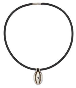 REGITZE OVERGAARD FOR GEORG JENSEN - A DANISH SILVER MELON PENDANT NECKLACE: REGITZE OVERGAARD FOR GEORG JENSEN - A DANISH SILVER MELON PENDANT NECKLACE 427, of pierced oval form, threaded to a black neoprene necklace. Post-1945 Georg Jensen mark, Copenhagen town mark, silver