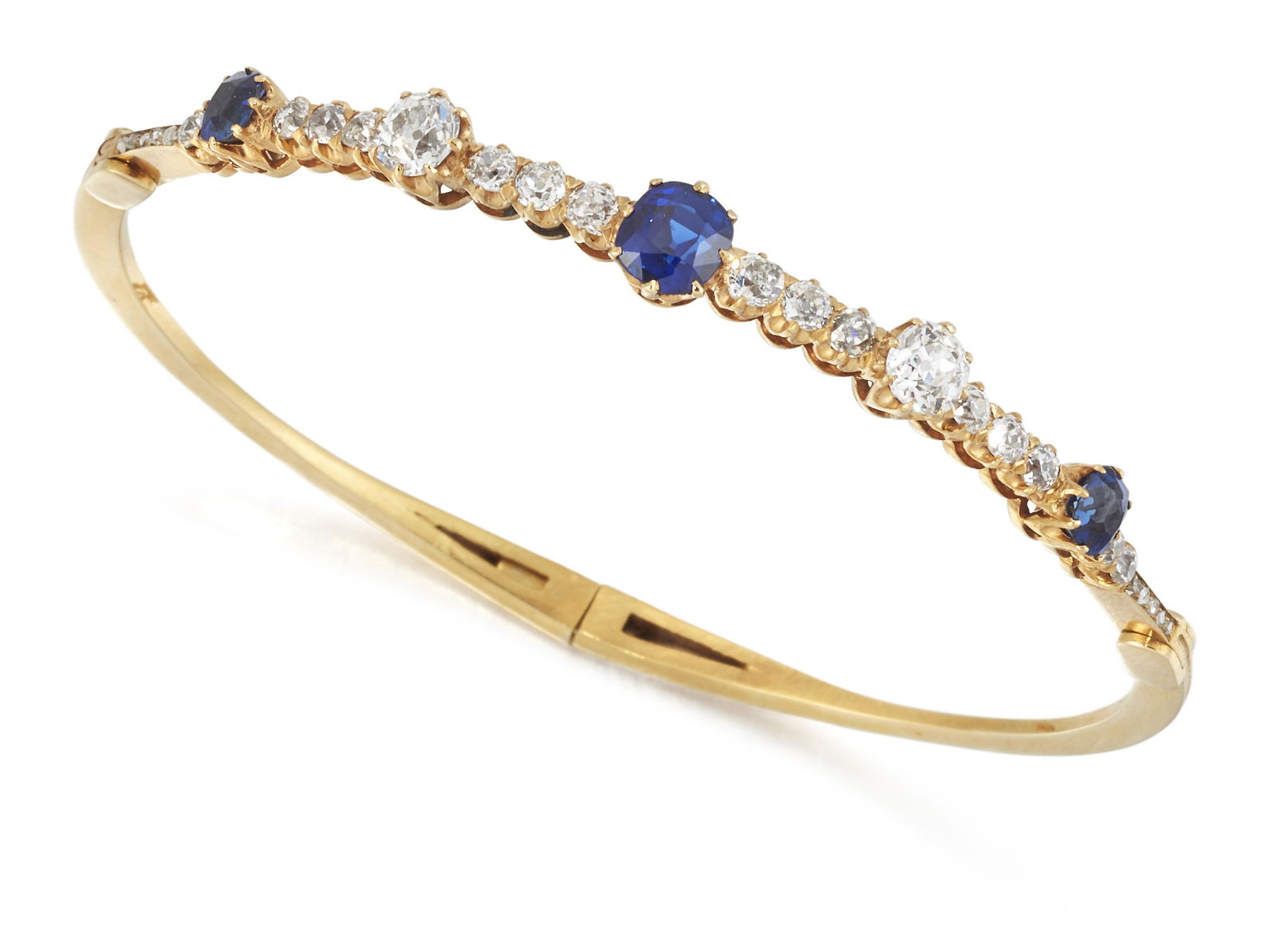 A LATE 19TH CENTURY SAPPHIRE AND DIAMOND BANGLE (1 of 1)
