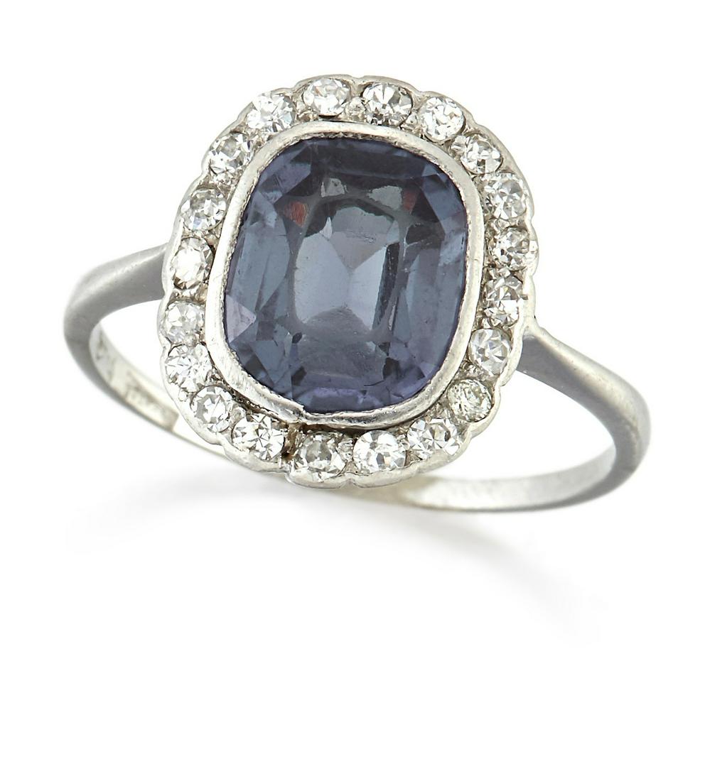 AN EARLY 20TH CENTURY SYNTHETIC COLOUR-CHANGE SAPPHIRE AND DIAMOND CLUSTER RING (1 of 1)