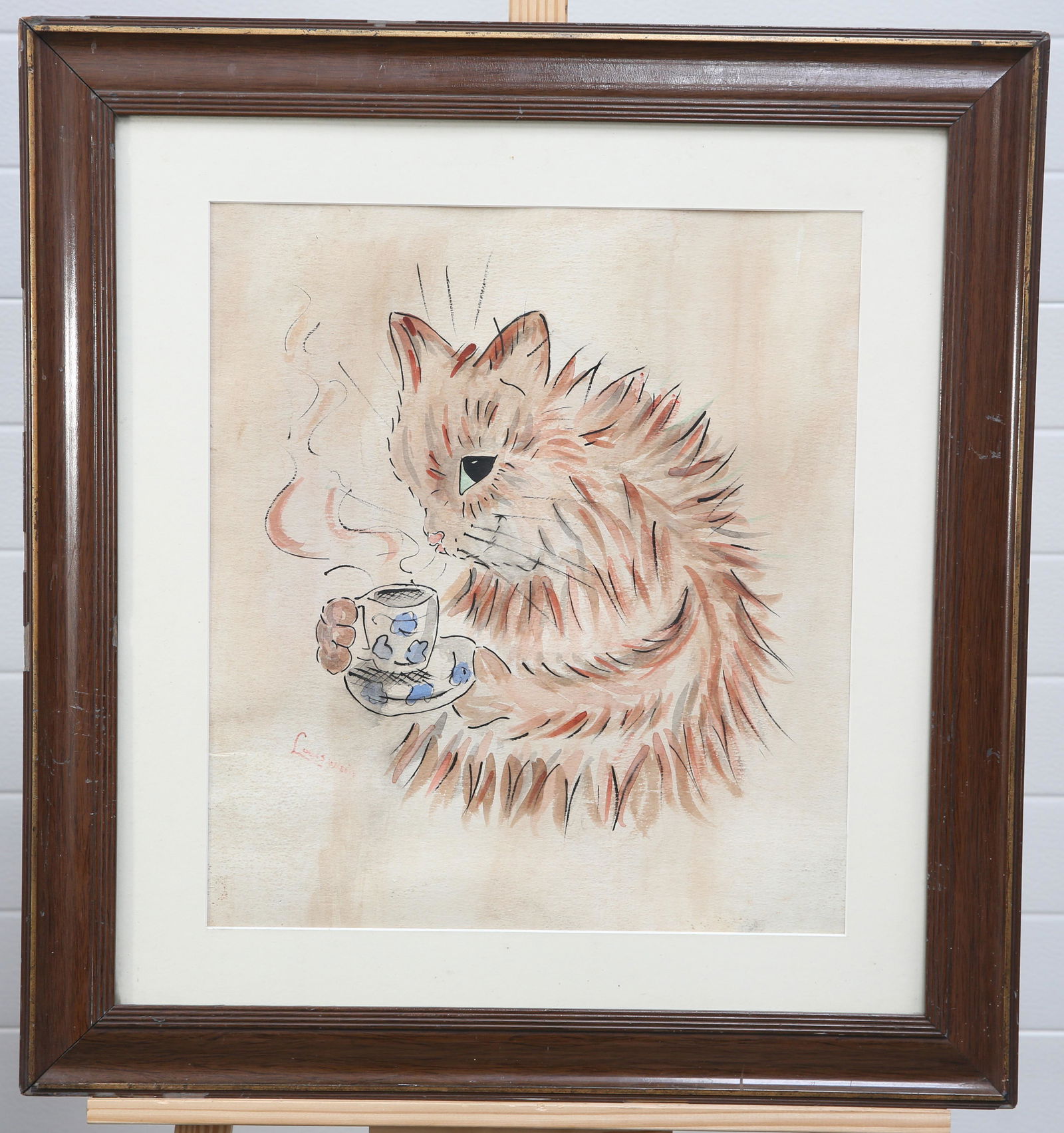 AFTER LOUIS WAIN (1860-1939), A CAT DRINKING A CUP OF TEA: bears signature lower left, watercolour, framed. 44cm by 39cm