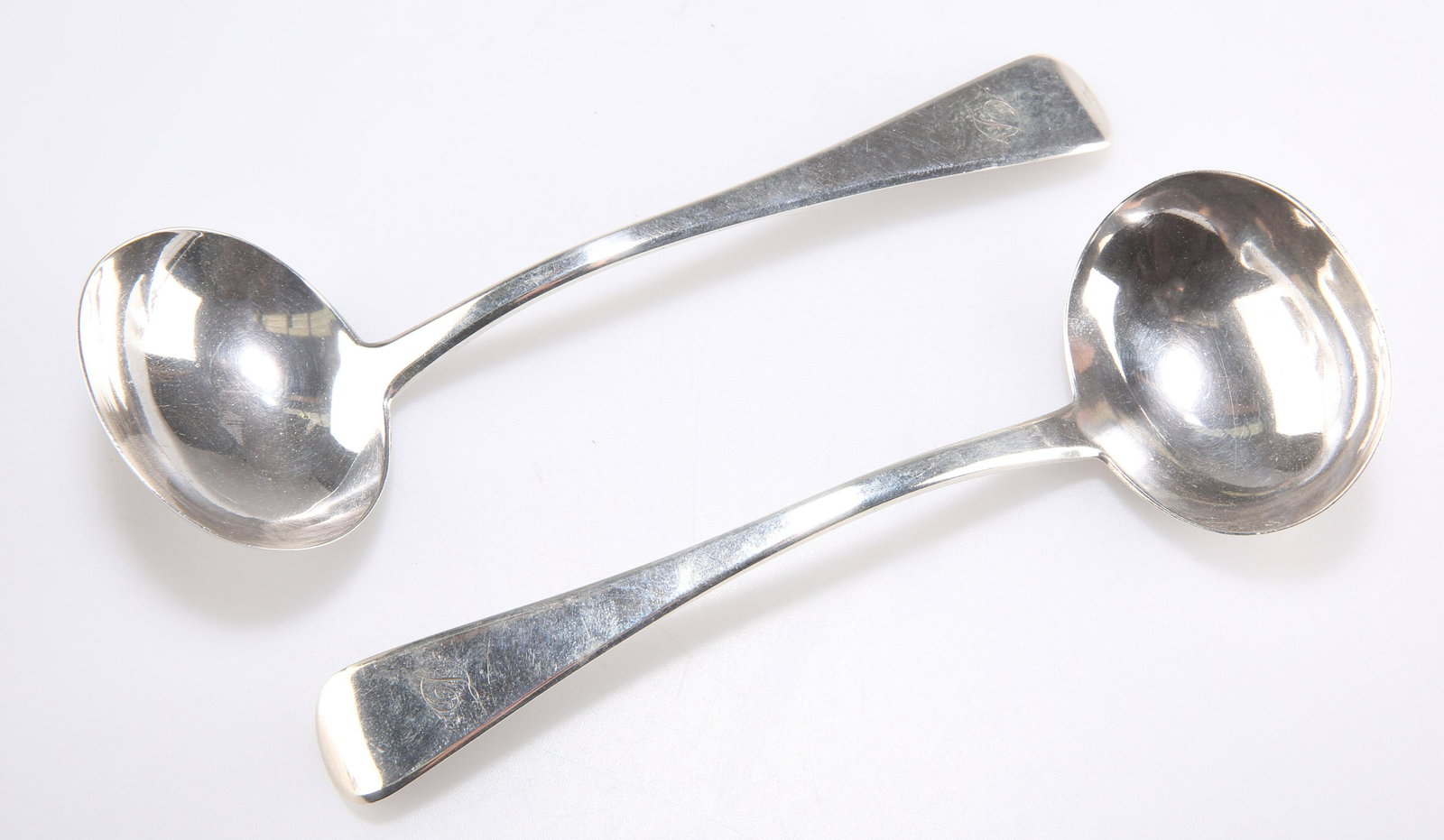 A PAIR OF GEORGE IV SILVER SAUCE LADLES (1 of 2)