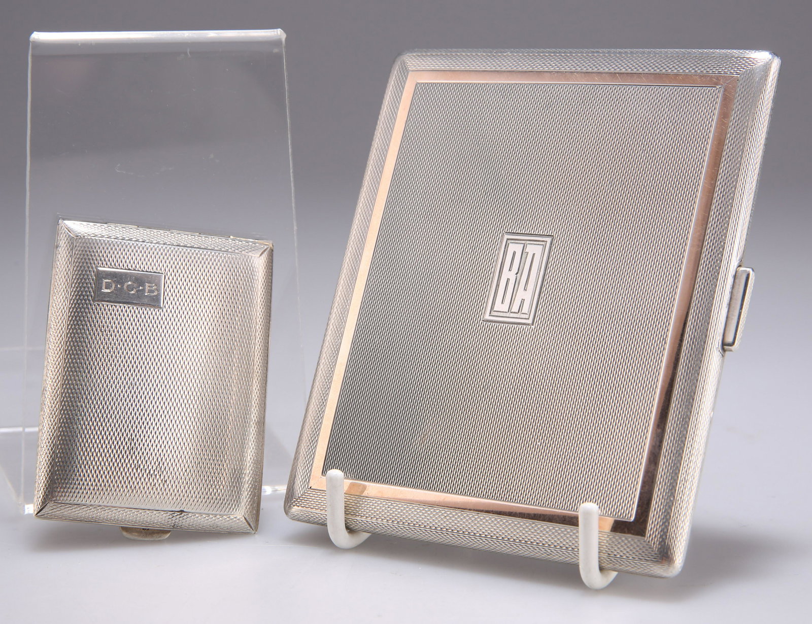 A GEORGE V SILVER CARD CASE AND A GEORGE VI SILVER CIGARETTE CASE (1 of 3)
