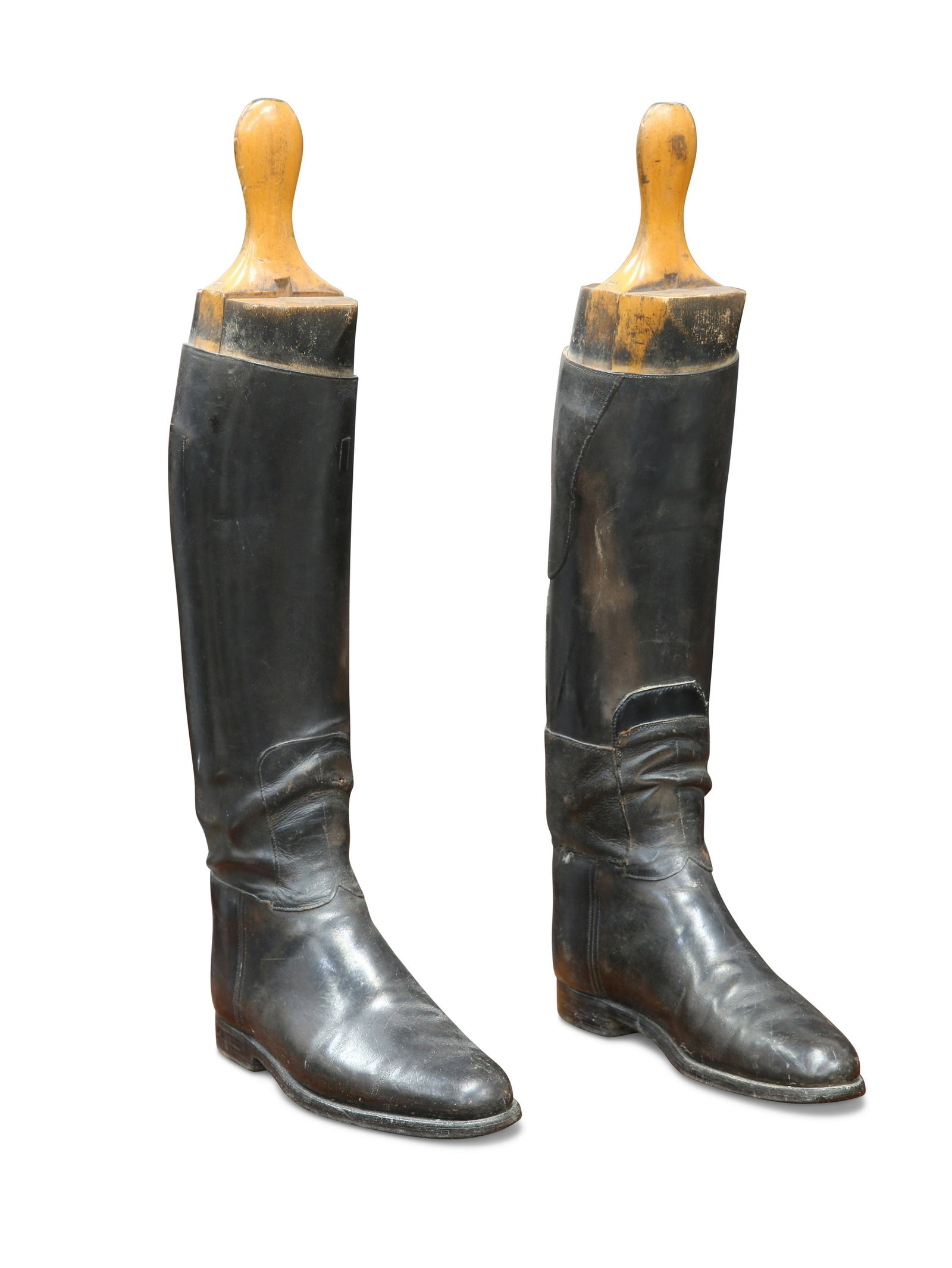 A PAIR OF LATE VICTORIAN BLACK LEATHER RIDING BOOTS: A PAIR OF LATE VICTORIAN BLACK LEATHER RIDING BOOTS with wooden trees. 64cm high overall