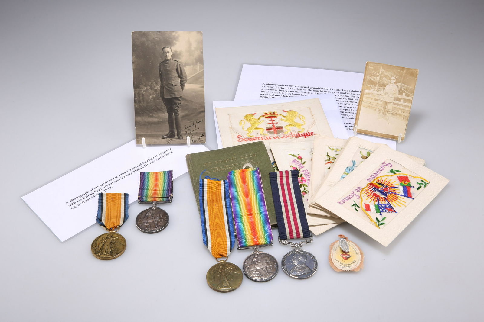 A FIRST WORLD PAIR AND TRIO, INCLUDING A MILITARY MEDAL FOR BRAVERY IN THE FIELD (1 of 2)