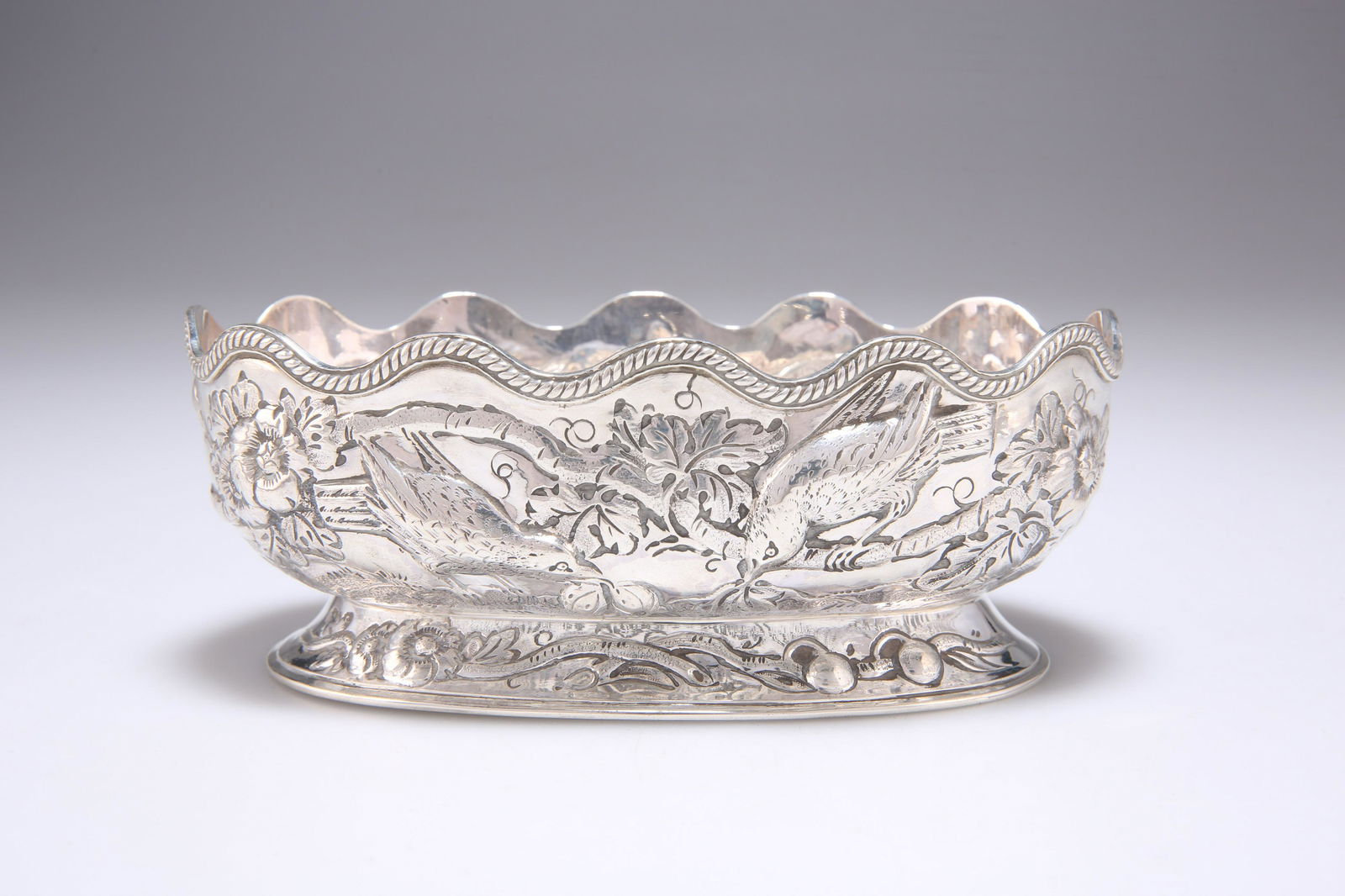 A VICTORIAN SILVER BOWL: A VICTORIAN SILVER BOWL by Charles Stuart Harris, London 1886. 14.5cm wide, 4.7 troy ounces