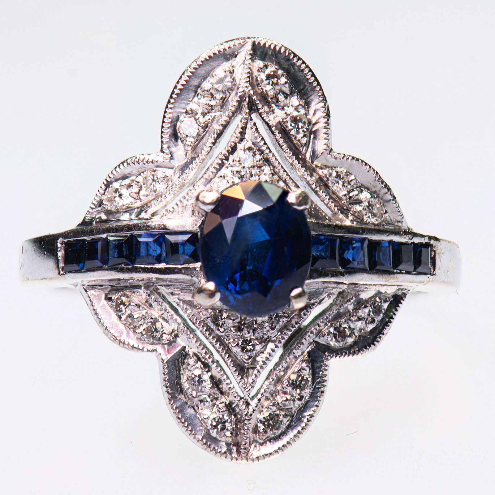 A SAPPHIRE AND DIAMOND CLUSTER RING (1 of 1)