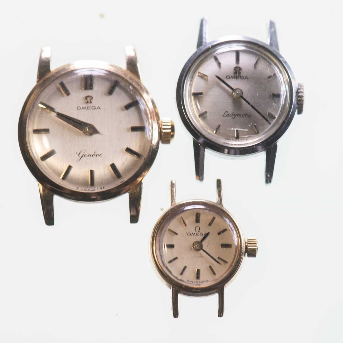 A TRIO OF LADY'S OMEGA WATCH HEADS (1 of 1)
