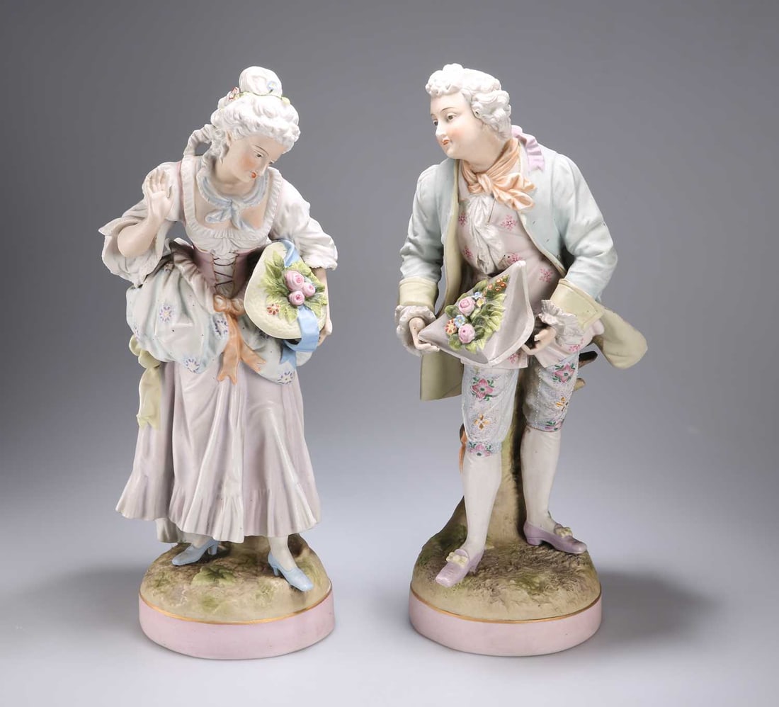 A LARGE PAIR OF CONTINENTAL BISQUE PORCELAIN FIGURES, CIRCA 1900 (1 of 1)