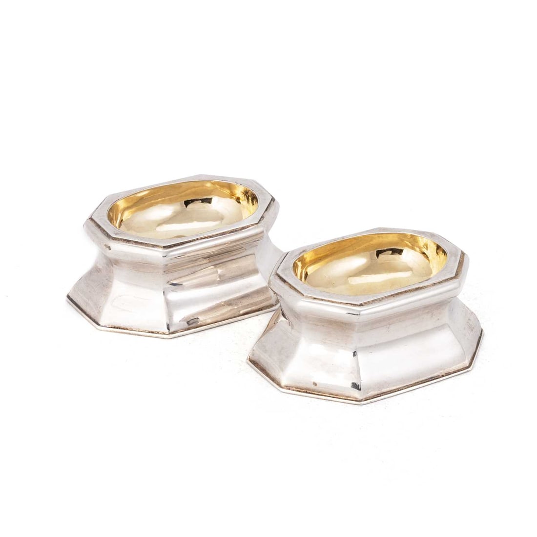 A PAIR OF GEORGE II SILVER TRENCHER SALTS (1 of 2)