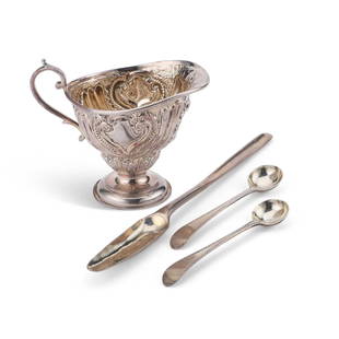 A GEORGE III SILVER MARROW SCOOP: A GEORGE III SILVER MARROW SCOOP maker's mark indistinct, London 1769; together with two George III silver salt spoons, one marked for Hester Bateman, London 1785; and a Victorian silver cream jug, by