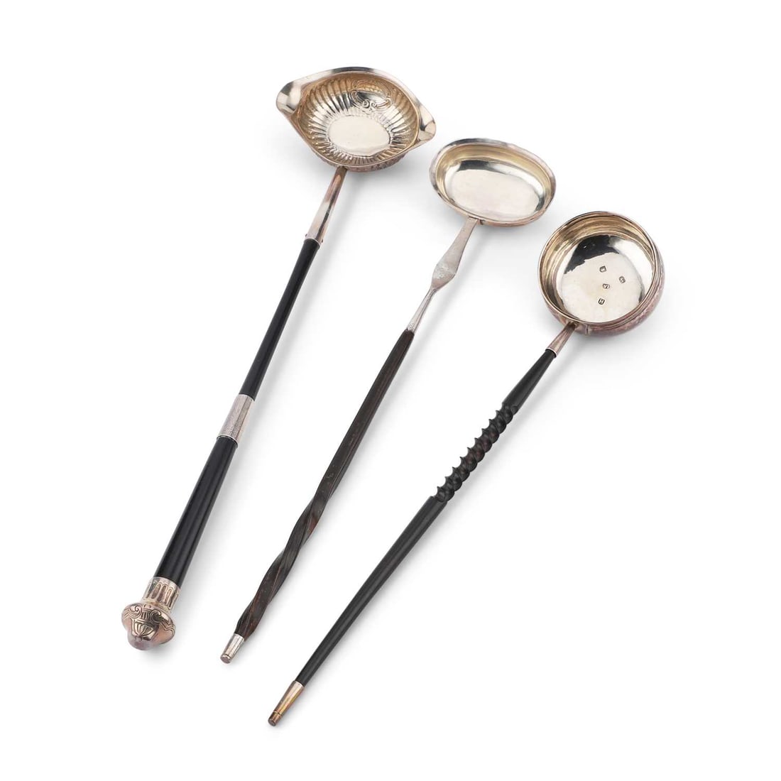 A GEORGE I SILVER TODDY LADLE: A GEORGE I SILVER TODDY LADLE by John Albright, London 1723, with a circular bowl and partially twist-turned handle, 35cm long; together with a Victorian silver toddy ladle, by Charles Stuart Harris,