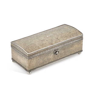 AN ARTS AND CRAFTS SILVER-MOUNTED SHAGREEN CIGARETTE BOX, CIRCA 1920: AN ARTS AND CRAFTS SILVER-MOUNTED SHAGREEN CIGARETTE BOX, CIRCA 1920 by John Paul Cooper, with a hinged, slightly domed top, the interior wood lined, struck JPC and with a plaque to the interior of th