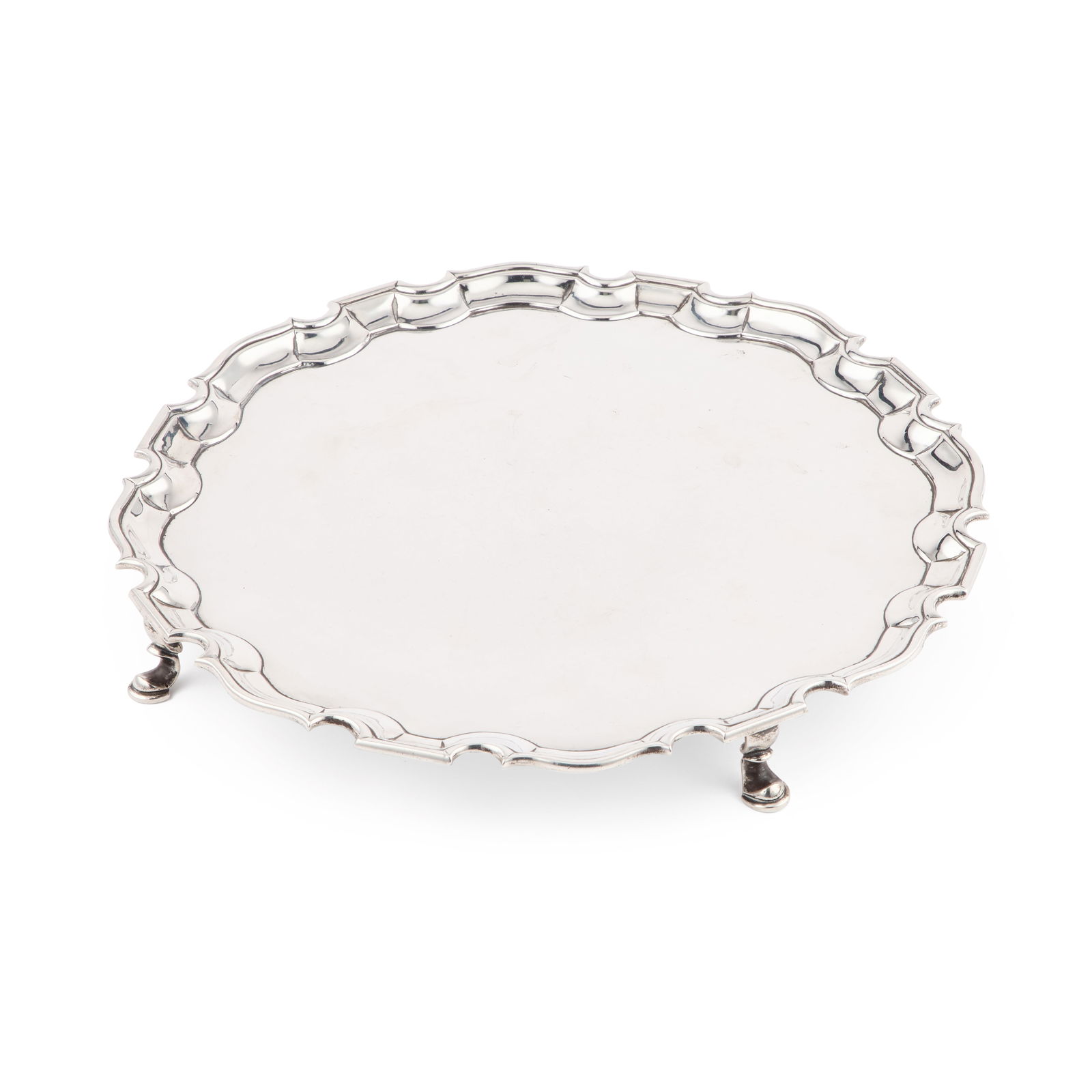 A GEORGE II SILVER SALVER: A GEORGE II SILVER SALVER by Robert Abercromby, London 1737, of shaped circular form with a moulded border, raised on four hoof feet. 31.5cm diameter, 27.6 troy ounces The marks are clear. Engraved K
