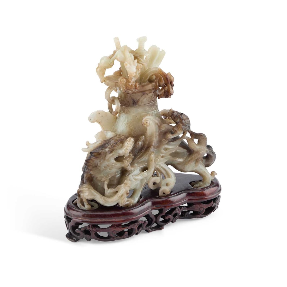 A CHINESE BLACK AND WHITE JADE 'MYTHICAL BEAST' VASE AND COVER: A CHINESE BLACK AND WHITE JADE 'MYTHICAL BEAST' VASE AND COVER late Qing Dynasty/ Republic Period, the cover with two chilong dragons, lingzhi fungus and precious objects, the archaistic pouring ve
