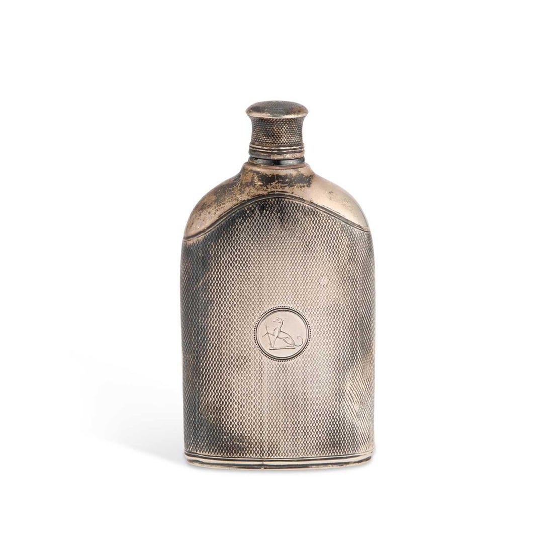 YORK: A WILLIAM IV SILVER HIP FLASK: YORK: A WILLIAM IV SILVER HIP FLASK by James Barber, George Cattle II & William North, York 1832, with an engine-turned ground and engraved with a crest. 12cm high, 4.5 troy ounces