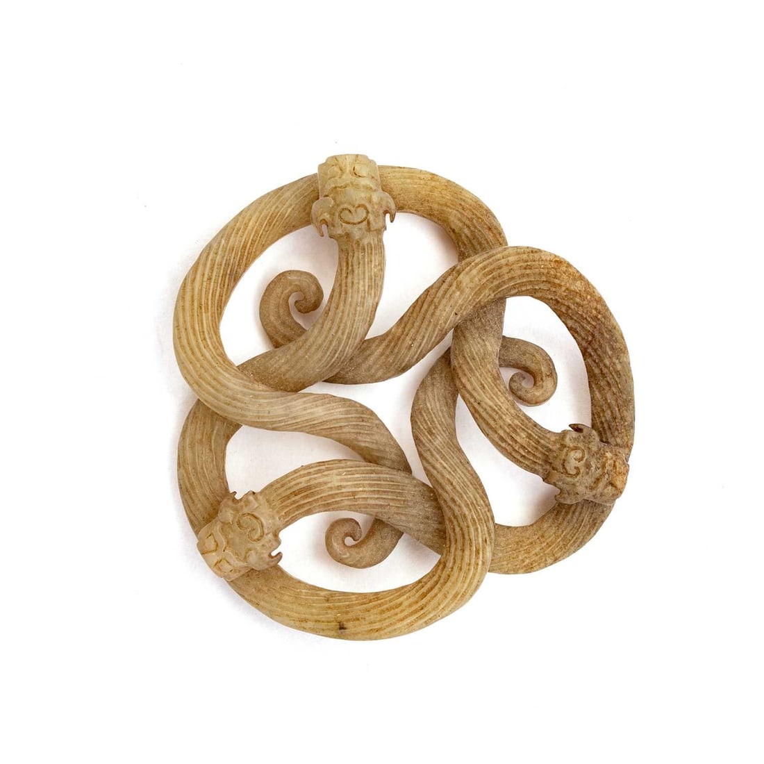 A 19TH CENTURY CHINESE CELADON JADE CARVING OF COILED CHILONG DRAGONS (1 of 3)