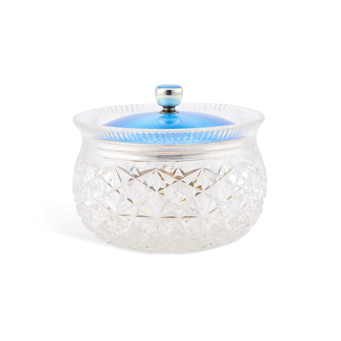 A LARGE ART DECO SILVER AND ENAMEL JAR: A LARGE ART DECO SILVER AND ENAMEL JAR by Charles & Richard Comyns, London 1925, the circular cover decorated with blue guilloche enamel, the glass jar cut with a hobnail pattern. 15cm diameter