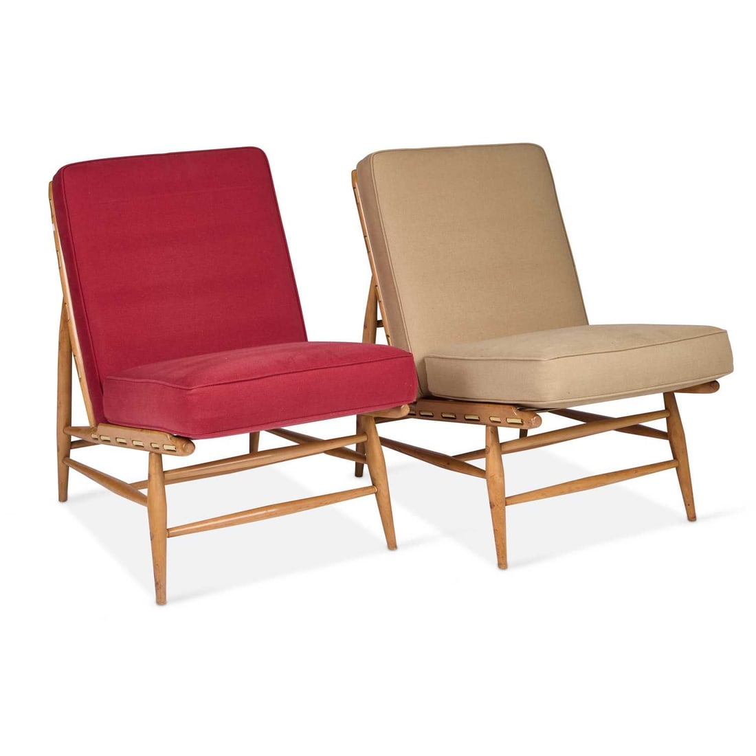 A PAIR OF ERCOL LIGHT ELM EASY CHAIRS: A PAIR OF ERCOL LIGHT ELM EASY CHAIRS each with blue label. (2) Height of backs 75cm to top of frame