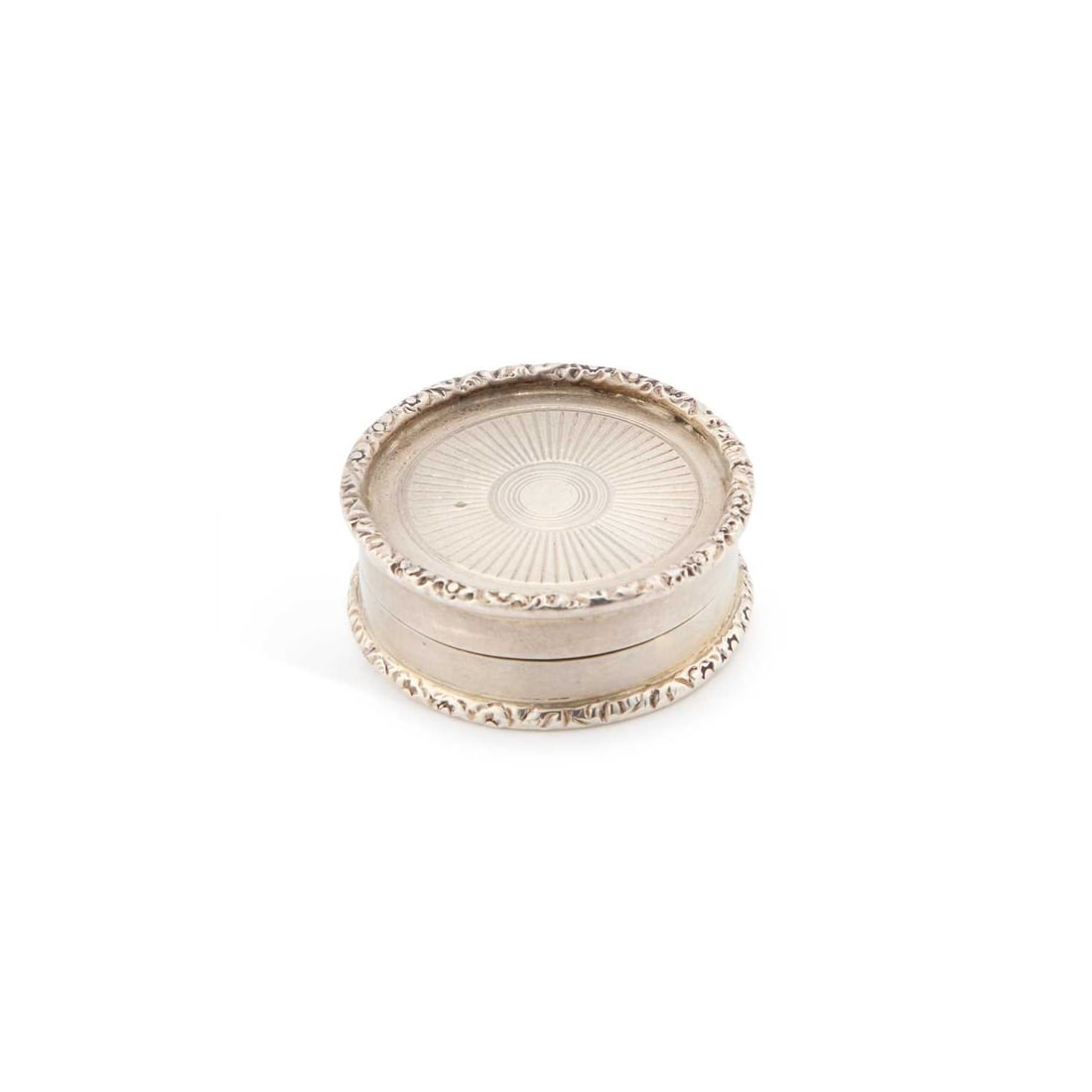 AN ELIZABETH II SILVER PILL BOX: AN ELIZABETH II SILVER PILL BOX by Mappin & Webb Ltd, Birmingham 1978, circular with hinged cover. 4cm diameter, 1.2 troy ounces