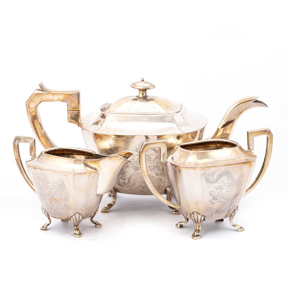 A CHINESE EXPORT SILVER THREE-PIECE TEA SERVICE (1 of 3)