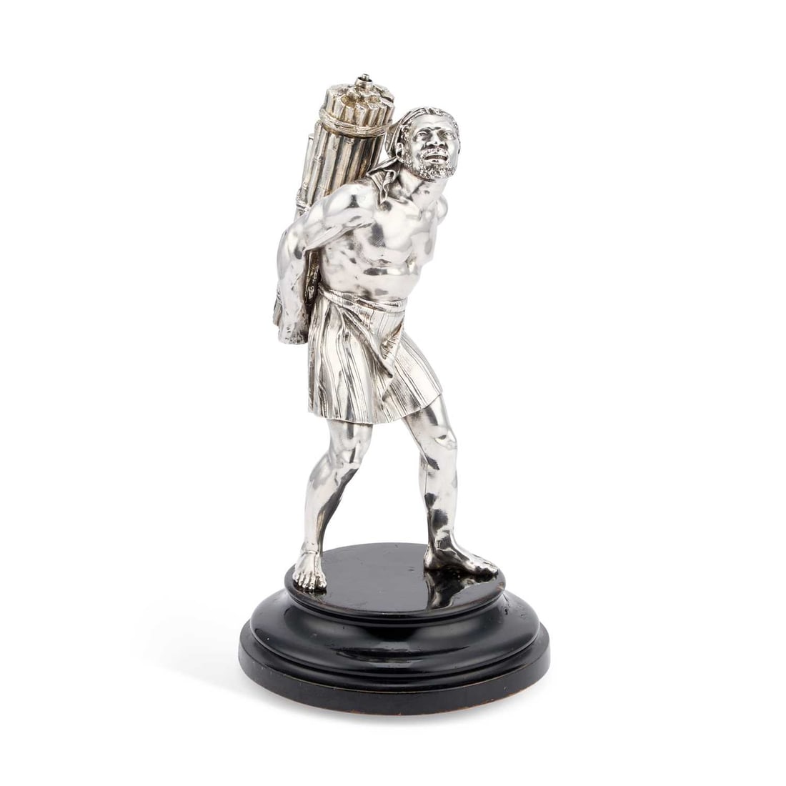A FINE VICTORIAN SILVER FIGURAL TABLE LIGHTER: A FINE VICTORIAN SILVER FIGURAL TABLE LIGHTER by James Barclay Hennell, London 1884, also signed, on an ebonised base with ivory roller feet. 31cm high, 58 troy ounces gross