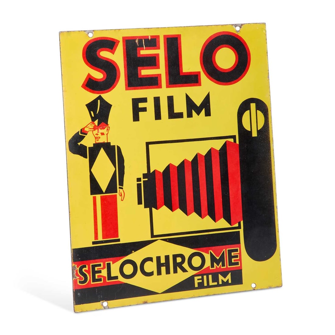 A SELO FILM ENAMEL ADVERTISING SIGN: A SELO FILM ENAMEL ADVERTISING SIGN decorated to each side with a folding camera, its bellows extended towards a saluting figure. 51cm by 41cm