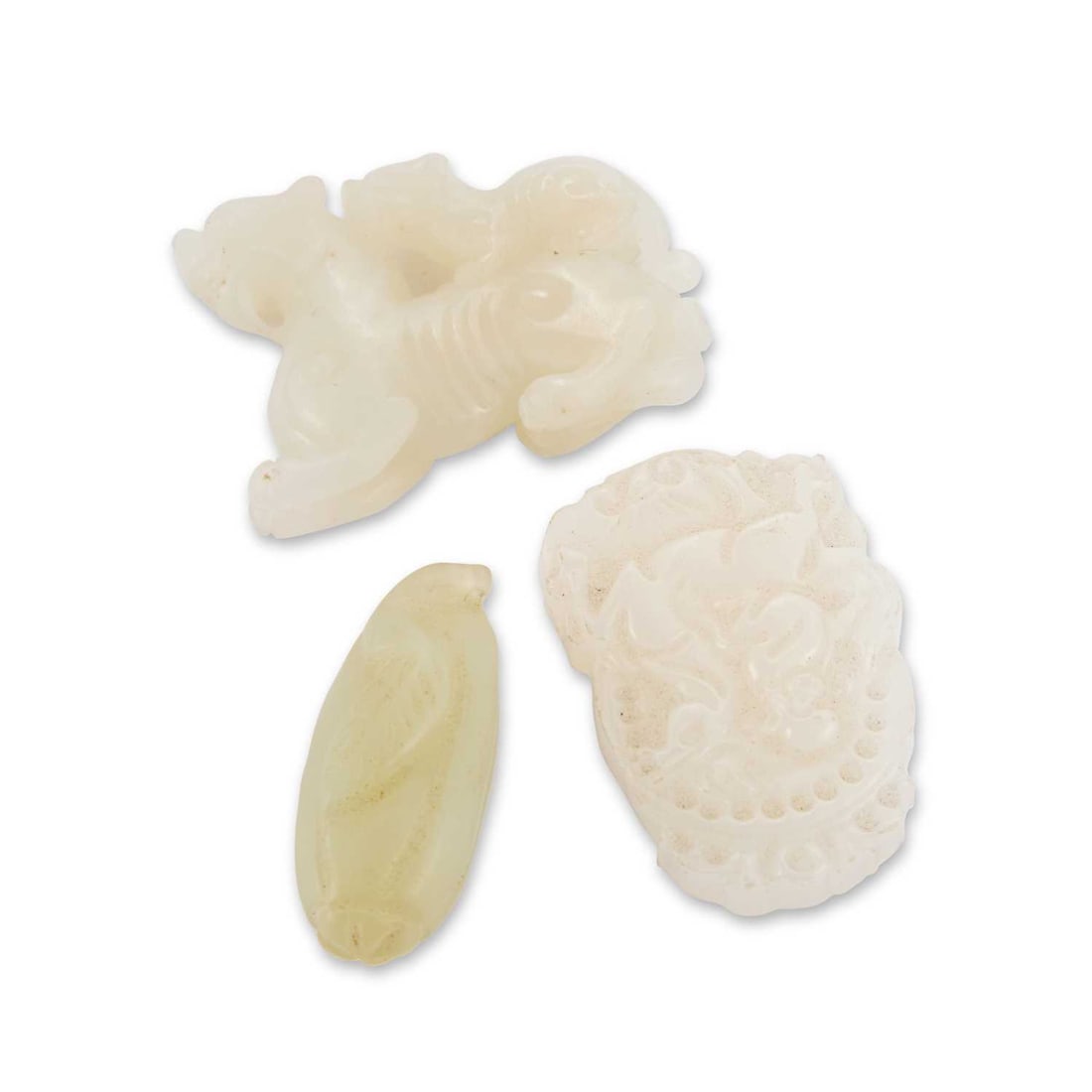 THREE CHINESE JADE CARVINGS: THREE CHINESE JADE CARVINGS comprising a carving of a gourd, two feline-like creatures and a plaque carved with a monkey riding a horse. (3) Gourd 4.5cm high