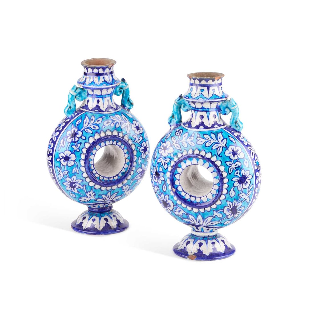 BOMBAY SCHOOL OF ARTS: A PAIR OF POTTERY FLASKS IN THE MULTAN STYLE, INDIA, CIRCA 1880: BOMBAY SCHOOL OF ARTS: A PAIR OF POTTERY FLASKS IN THE MULTAN STYLE, INDIA, CIRCA 1880 (2) 29cm high