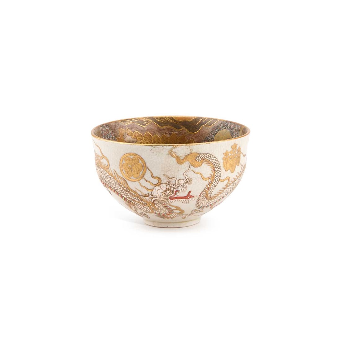 A JAPANESE SATSUMA EARTHENWARE BOWL: A JAPANESE SATSUMA EARTHENWARE BOWL Meiji period, of ogee-sided form, internally painted with a crowd of arhats, holding Buddhistic emblems, run through by a dragon with white scales, externally with 