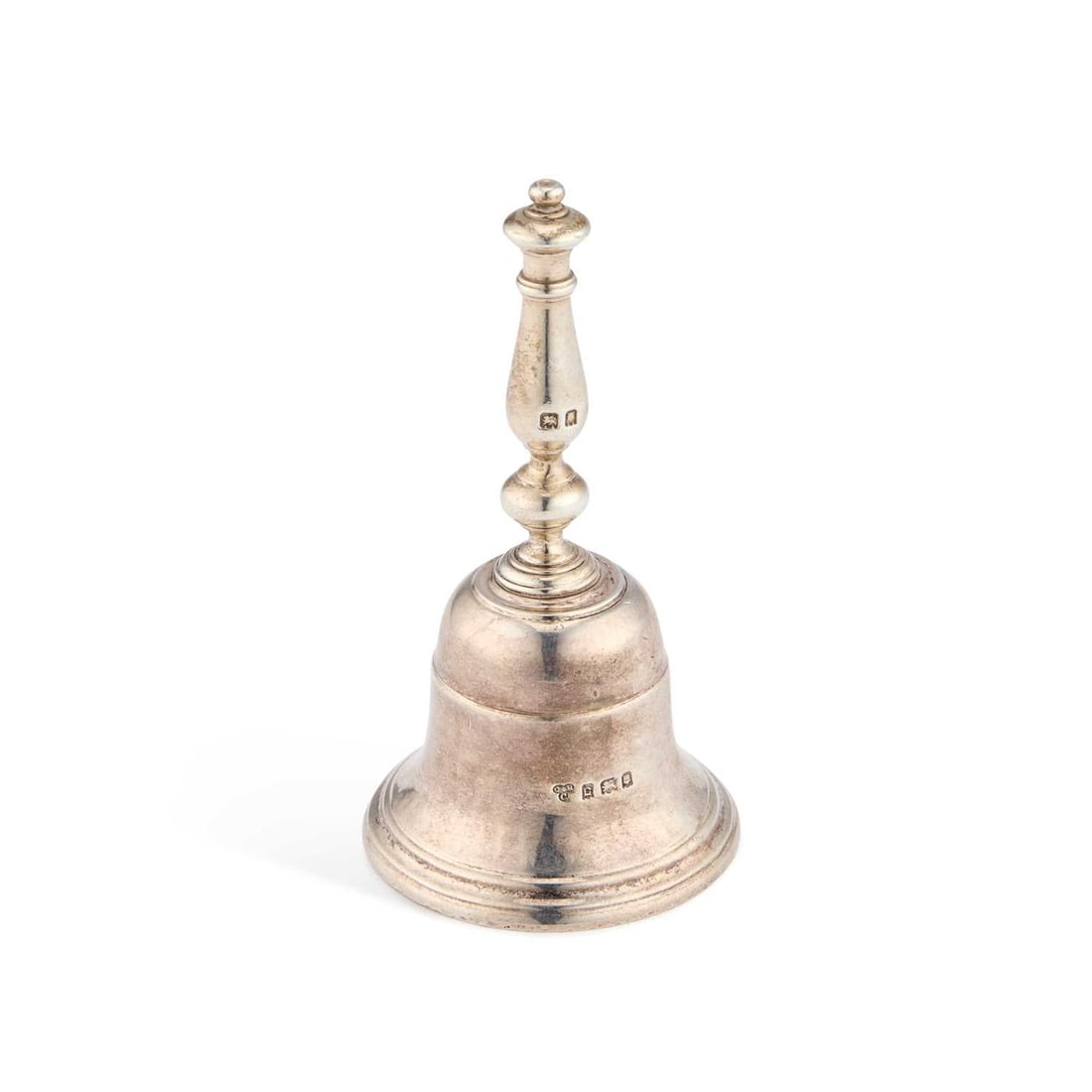 A GEORGE V CAST SILVER TABLE BELL: A GEORGE V CAST SILVER TABLE BELL by Charles & Richard Comyns, London 1918. 10.5cm high, 5.1 troy ounces