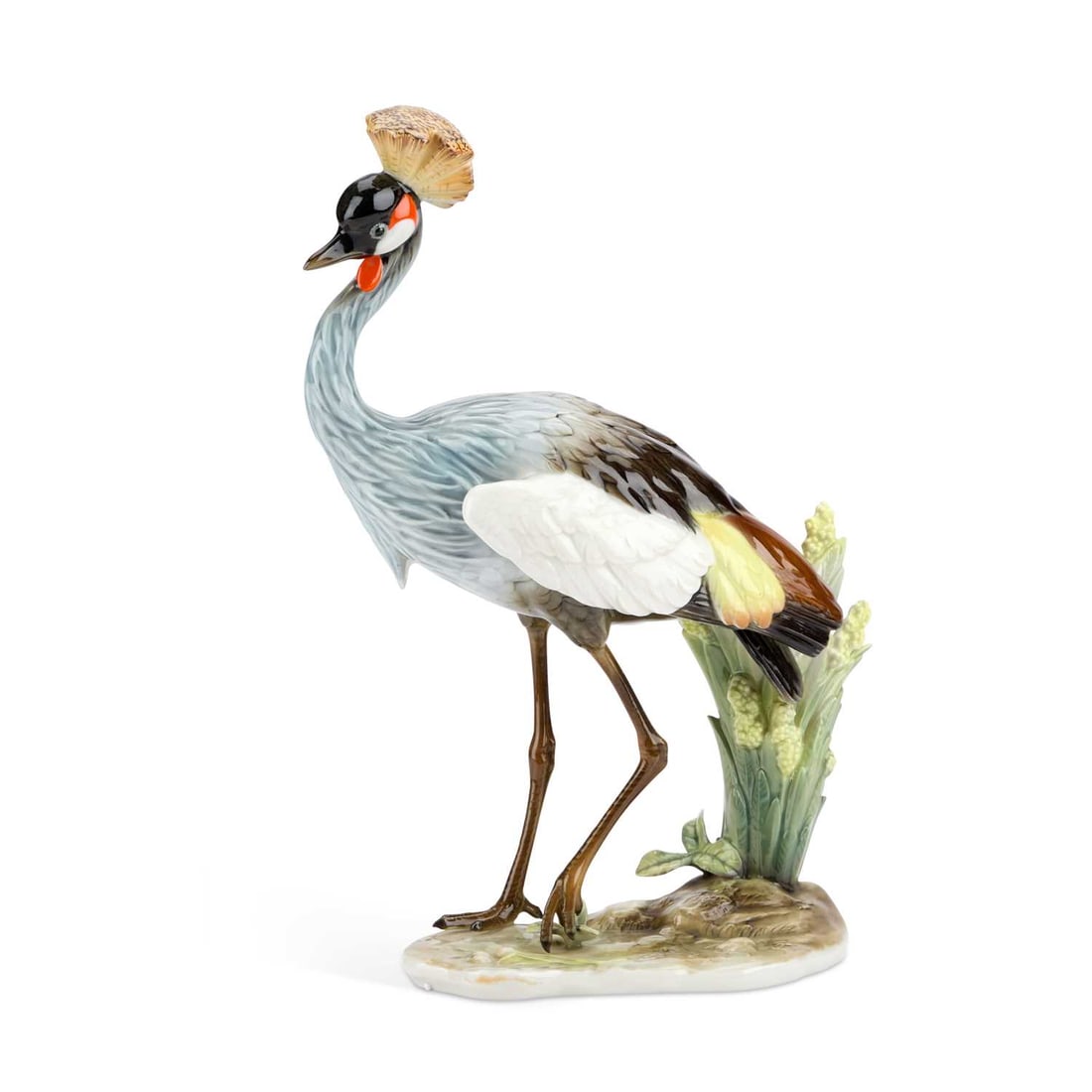 A HUTSCHENREUTHER PORCELAIN MODEL OF A CROWNED CRANE: A HUTSCHENREUTHER PORCELAIN MODEL OF A CROWNED CRANE modelled standing on a naturalistic base, printed factory mark. 30cm high