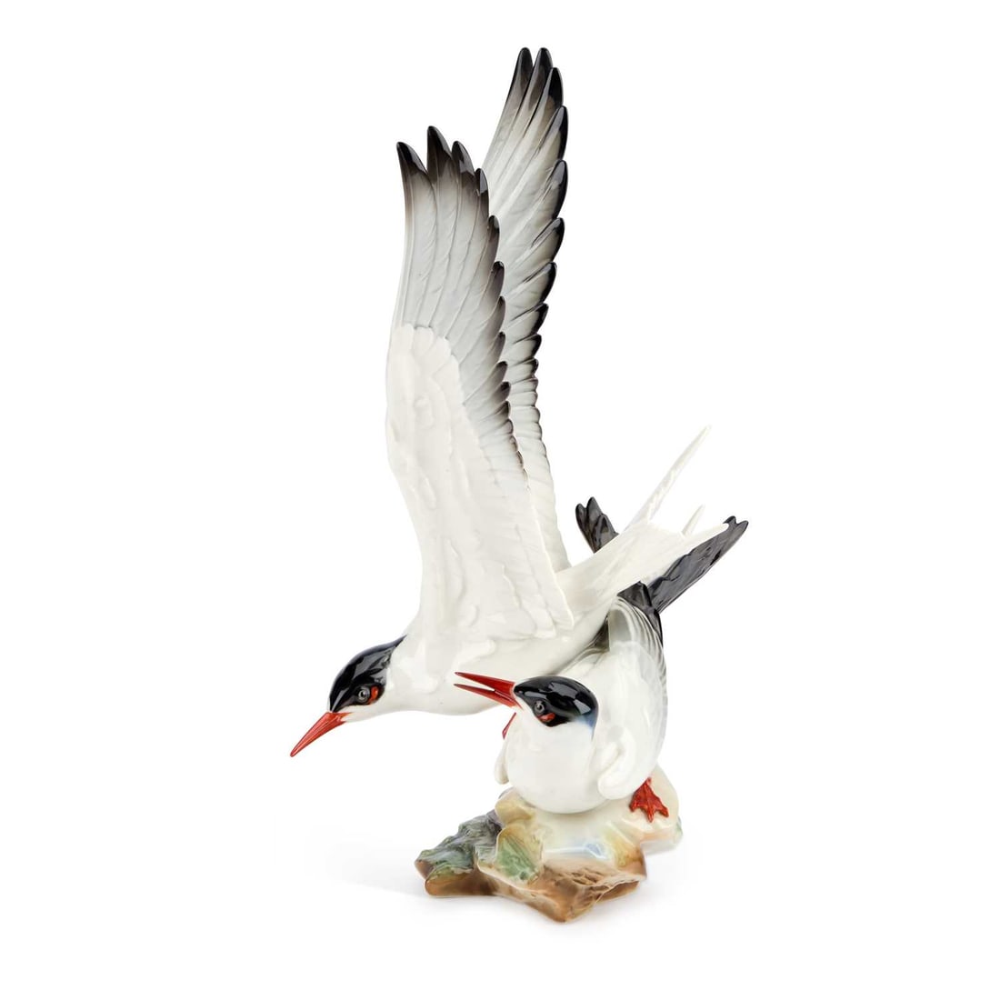 GÜNTHER GRÄNGET FOR HUTSCHENREUTHER, A PORCELAIN MODEL OF ARCTIC TERNS: GÜNTHER GRÄNGET FOR HUTSCHENREUTHER, A PORCELAIN MODEL OF ARCTIC TERNS naturalistically modelled as a pair of terns perched on rocks, model no. 8298, with printed factory mark. 34.5cm high