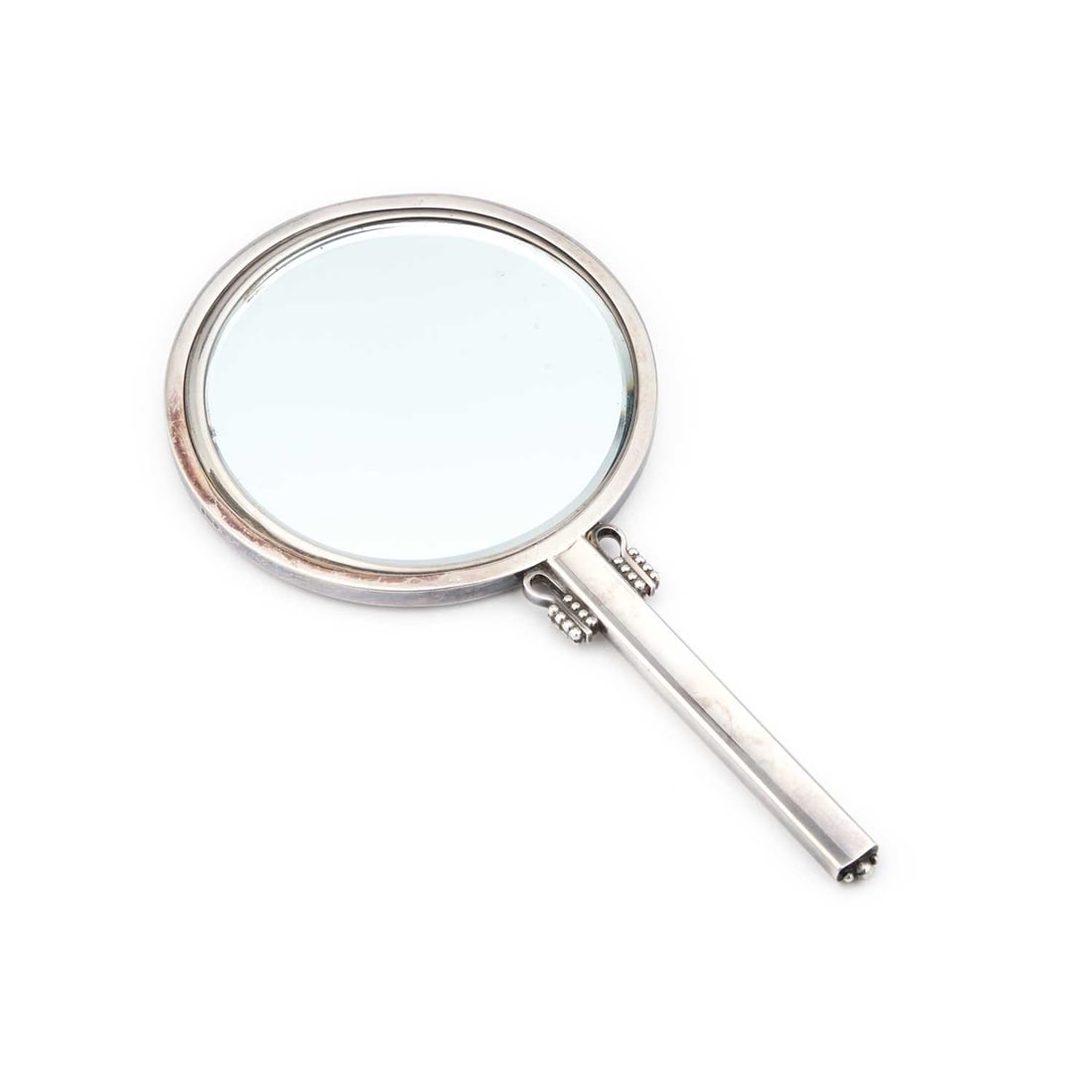 HARALD NIELSEN FOR GEORG JENSEN, A DANISH STERLING SILVER HAND-MIRROR: HARALD NIELSEN FOR GEORG JENSEN, A DANISH STERLING SILVER HAND-MIRROR import marks, London 1957. 21.5cm long