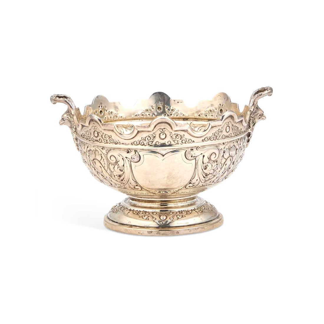 A GEORGE V SILVER TWO-HANDLED BOWL: A GEORGE V SILVER TWO-HANDLED BOWL by Charles Clement Pilling, Sheffield 1922, circular with rounded sides and a stepped domed circular foot, chased with scrolls and flowers beneath an undulating rim