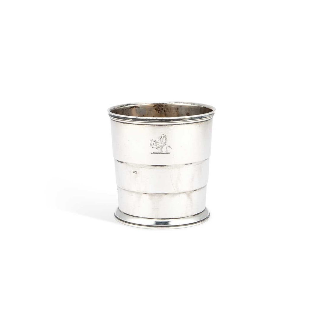 A VICTORIAN SILVER COLLAPSIBLE BEAKER: A VICTORIAN SILVER COLLAPSIBLE BEAKER by Thomas Johnson I, London 1855, of plain tapering cylindrical form with a spreading foot. 7cm high, 3.9 troy ounces