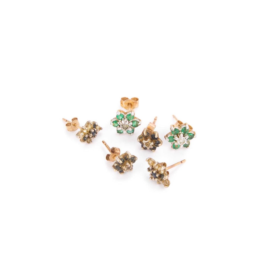 THREE PAIRS OF STUD EARRINGS: THREE PAIRS OF STUD EARRINGS comprising a pair of diamond and emerald cluster earrings; a pair of sapphire and diamond cluster earrings; and a pair of blue and white spinel cluster earrings, all with