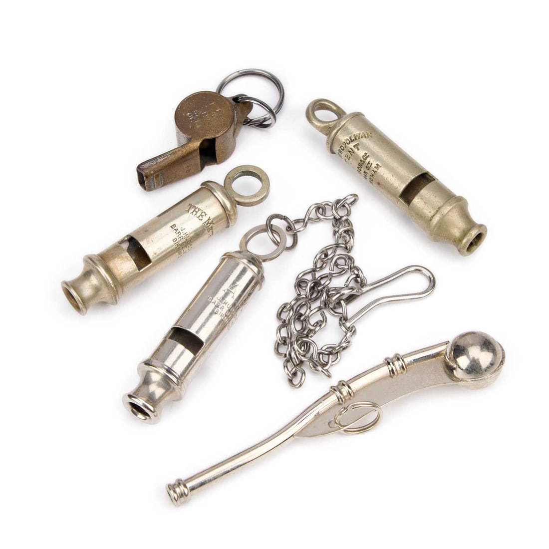 A GROUP OF WHISTLES: A GROUP OF WHISTLES including an Air Ministry example, a military bosun, etc. (5) Bosun 11.5cm long