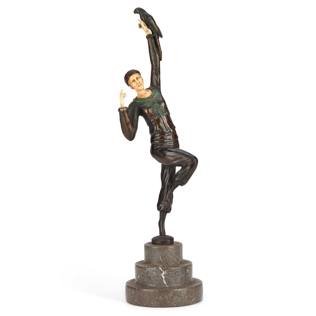 AFTER PAUL PHILIPPE, A BRONZE AND FAUX IVORY FIGURE: AFTER PAUL PHILIPPE, A BRONZE AND FAUX IVORY FIGURE the young lady model balancing on her left foot, a parrot seated on her raised left arm, inscribed P.Philippe. 38cm high
