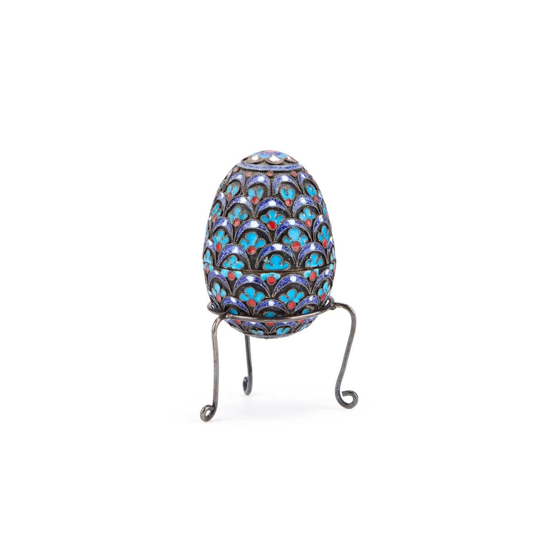 A CONTINENTAL SILVER AND ENAMEL EGG ON STAND: A CONTINENTAL SILVER AND ENAMEL EGG ON STAND the egg and stand stamped 950. (2)