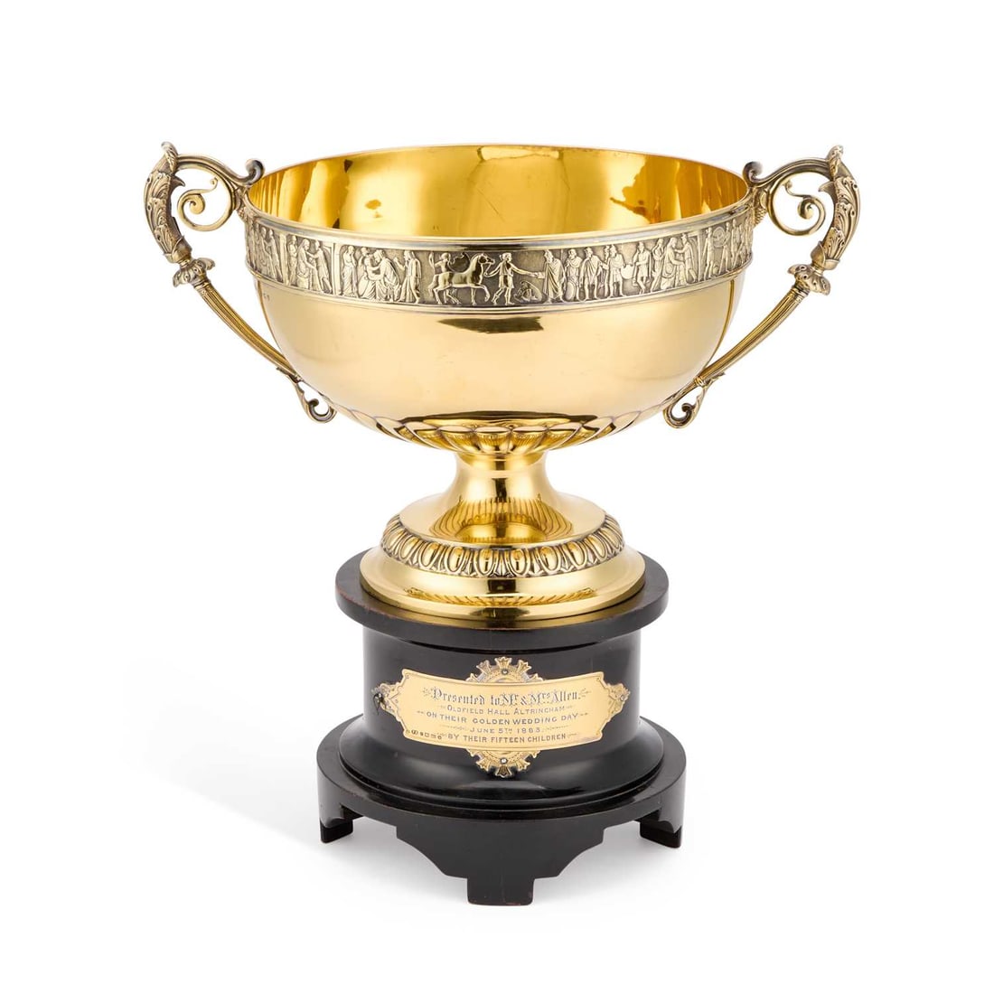 A FINE VICTORIAN SILVER-GILT TWO-HANDLED BOWL: A FINE VICTORIAN SILVER-GILT TWO-HANDLED BOWL by Elkington & Co (Frederick Elkington), Birmingham 1882, the circular bowl decorated in relief with a frieze of medieval figures above rounded sides