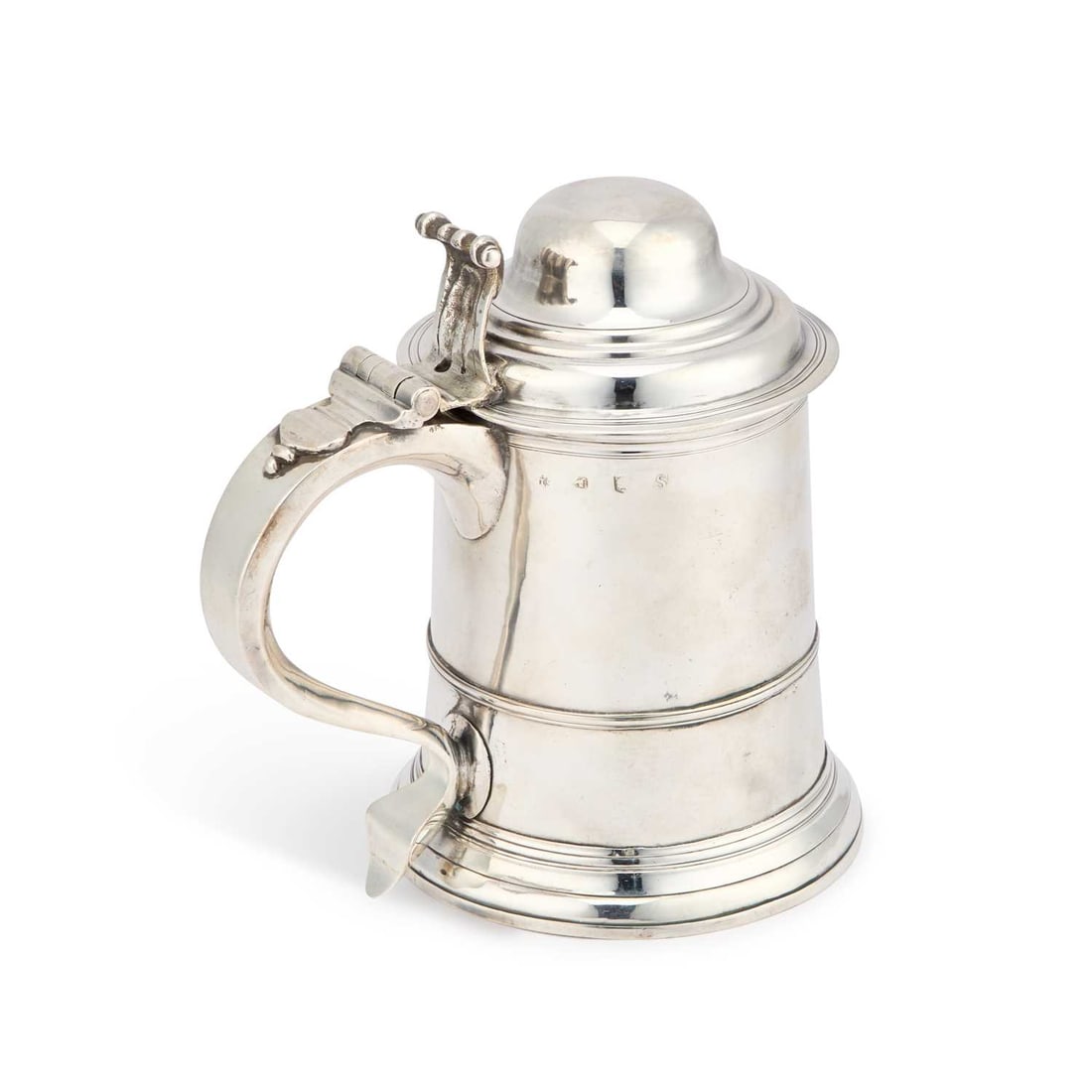 A GEORGE II SILVER TANKARD: A GEORGE II SILVER TANKARD by James Smith I, London 1733, the plain cylindrical girdled body with a domed cover and scroll handle, engraved with initials. 18.5cm high, 24.9 troy ounces
