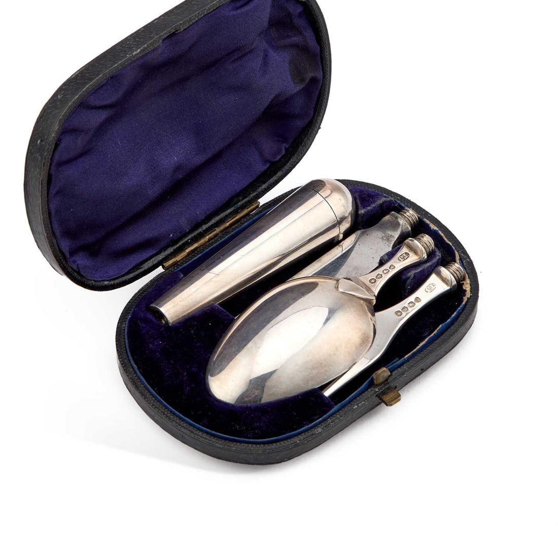 A VICTORIAN SILVER TRAVELLING FORK, KNIFE AND SPOON SET WITH A CORKSCREW: A VICTORIAN SILVER TRAVELLING FORK, KNIFE AND SPOON SET WITH A CORKSCREW by Thomas Johnson I London 1877, the three screw-in handles of cannon form, the smallest one opens to reveal a corkscrew, in a